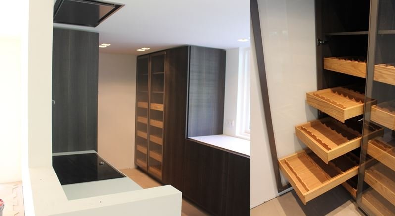 In de keuken geïntegreerde eiken wijnkast.